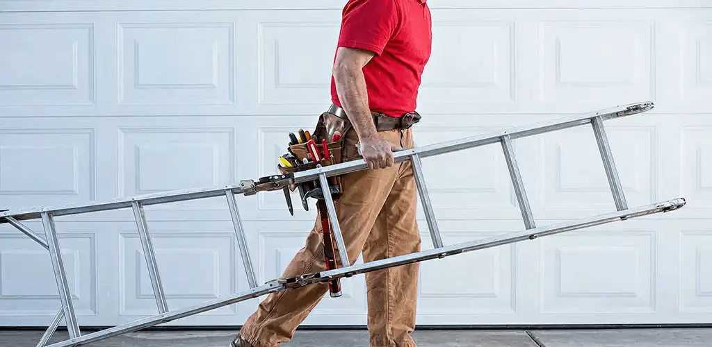 Garage door repair technician arriving with tools and ladder in Boulder, CO