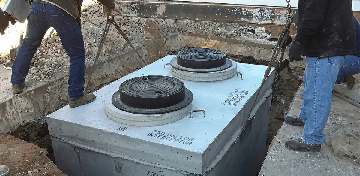 Grease trap installation for a commercial property drainage system in Boulder, CO